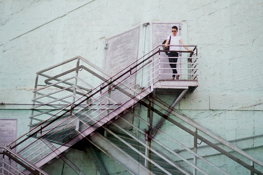 person standing on stairs, human, people, maringá, brazil, stairwell HD wallpaper