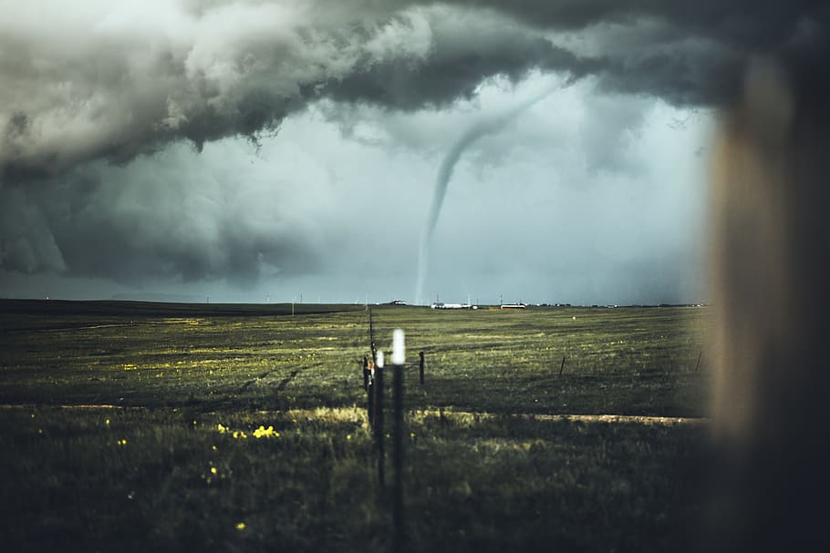 tornado on far side on plain, cloud - sky, storm, beauty in nature HD wallpaper