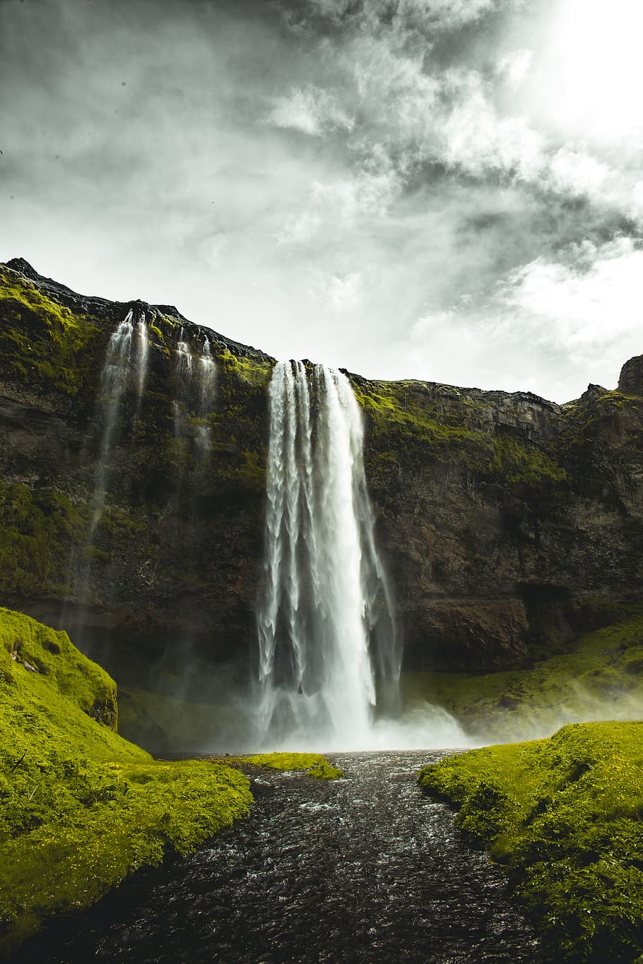 waterfalls under cloudy sky during daytime, iceland, sunny, icelandic