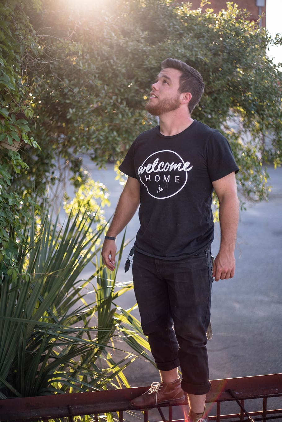 man standing near tree, plant, one person, real people, casual clothing HD wallpaper