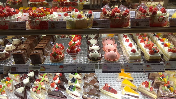 Assorted Pastry on Shelf, assortment, baked, bakery, cakes, chocolate HD wallpaper