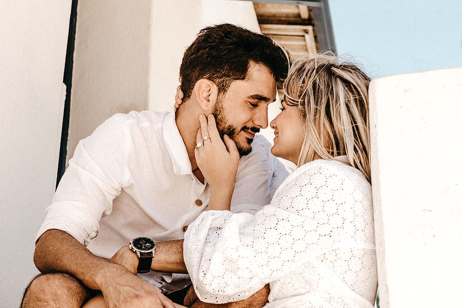 smiling-man-and-woman-about-to-kiss.jpg