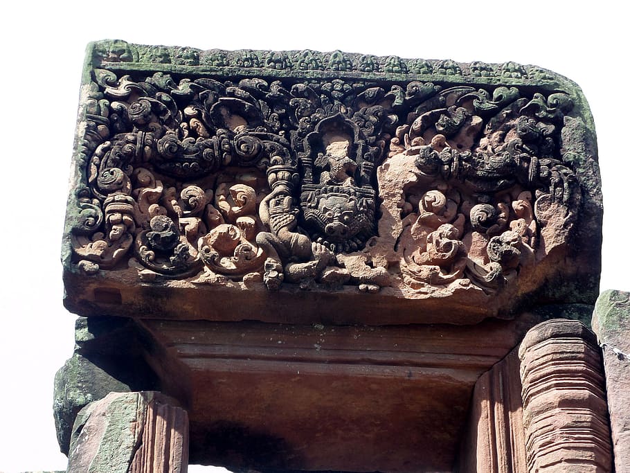 Ancient Hindu carvings in 700 year old in temple ruins dedicated to the god Shiva and located in Roi-et Thailand