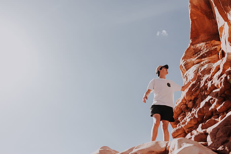 man standing on cliff, person, human, people, adventure, sports HD wallpaper