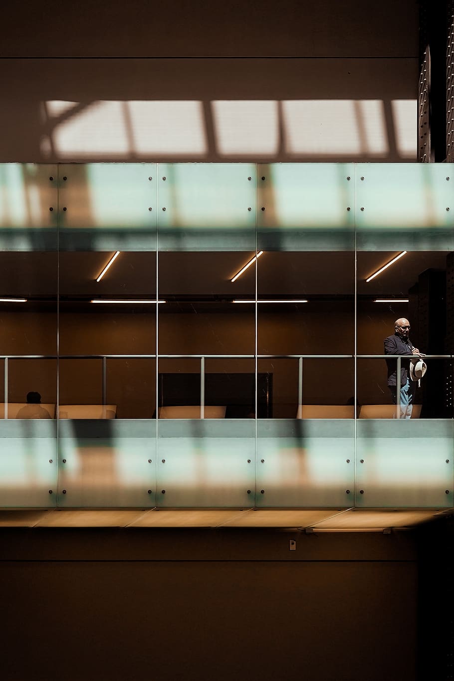 person standing during daytime, human, banister, handrail, lighting, HD wallpaper