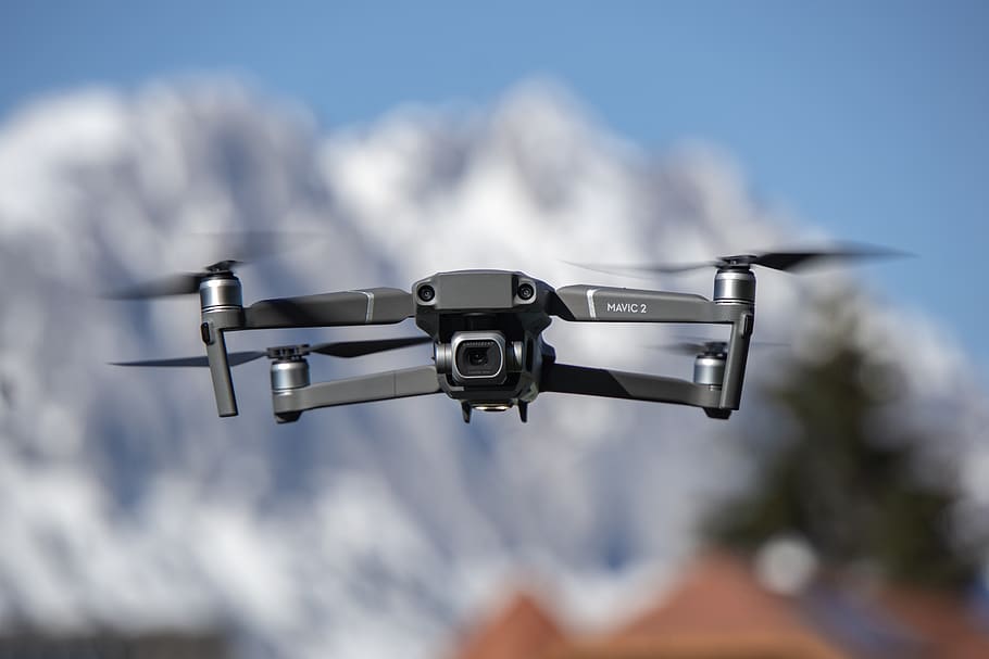 grey Mavic 3 drone in flight, sink faucet, blur, hasselblad, dji