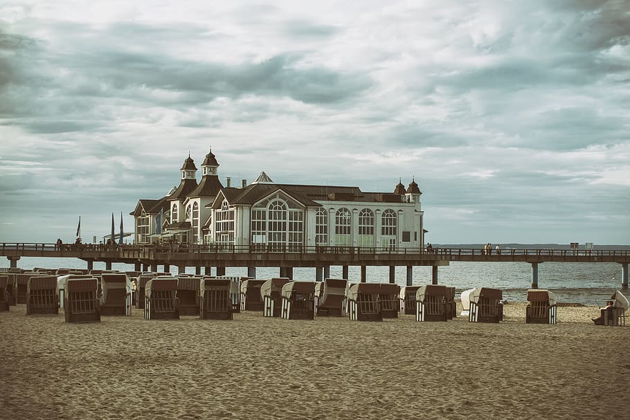 sea, seaside, cafe, beach, beach chair, sea bridge, storm, cloudy HD wallpaper