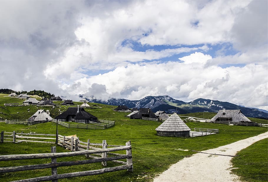 stables, huts, fences, grass, rural, sky, clouds, cloud - sky HD wallpaper