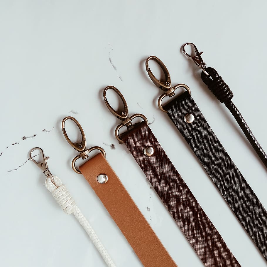 brown leather belts, indoors, white background, still life, studio shot HD wallpaper