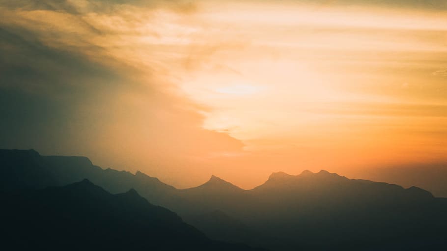 silhouette f mountain summit under cloudy sky, orange, yellow HD wallpaper