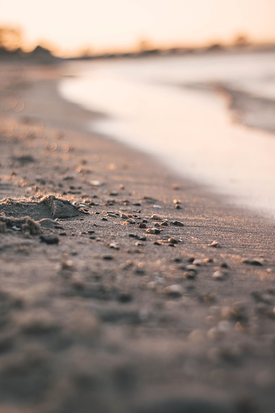 sand, rock, pebble, shore, coast, shoreline, beach, blur, bokeh HD wallpaper
