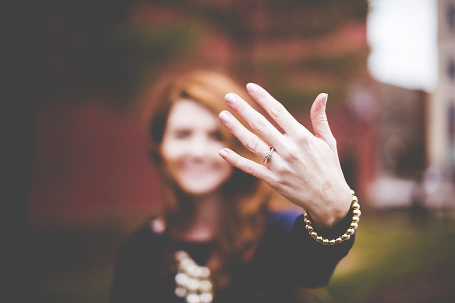 woman showing silver-colored ring, one person, focus on foreground HD wallpaper