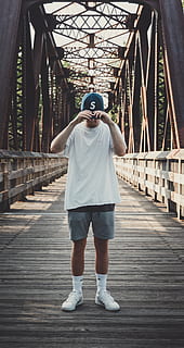 Man in White Crew-neck T-shirt Standing on Bridge, architecture HD wallpaper