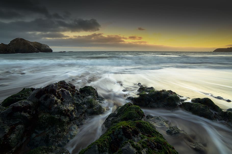 Rocks on Seashore during Golden Hour, beach, dawn, dramatic, dusk HD wallpaper