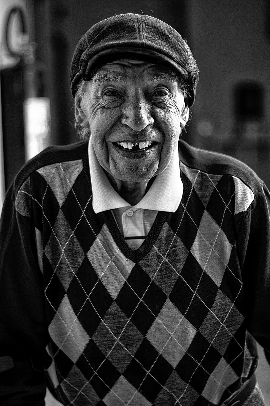 Man Wearing Newsboy Hat and Sweater, adult, black and white, black-and-white