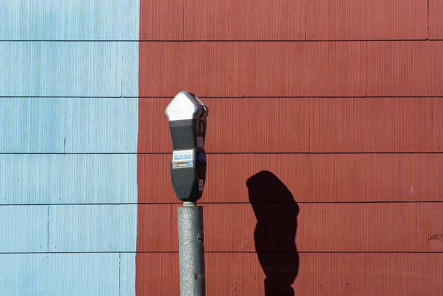 park meter beside wall, shadow, wood - material, day, no people HD wallpaper