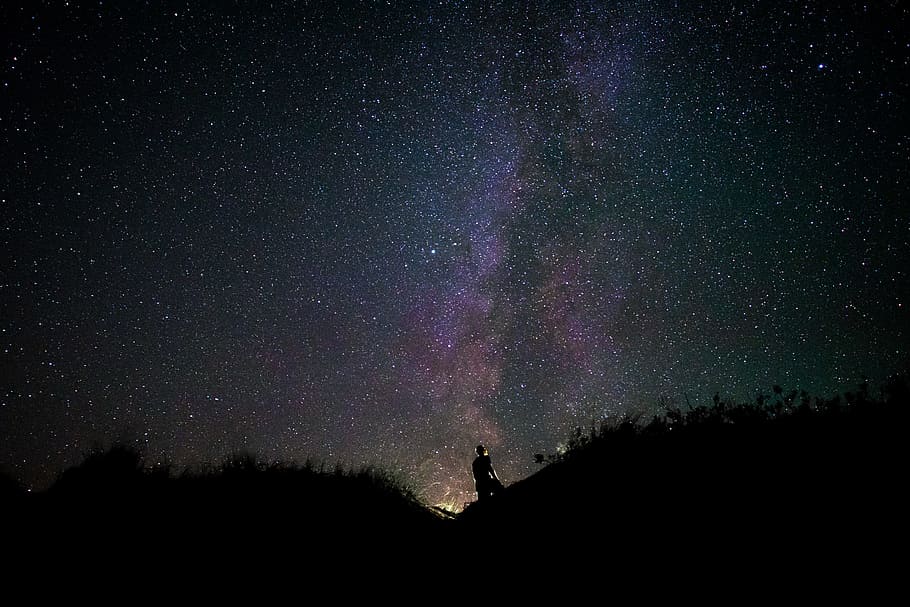 silhouette of man on mountain during nighttime, sky, star, person