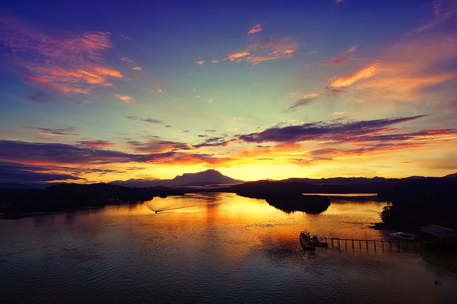 Silhouette of Mountain during Sunset, boats, clouds, dark, dramatic sky HD wallpaper