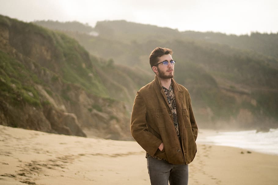 man in brown jacket, nature, outdoors, person, human, soil, clothing HD wallpaper