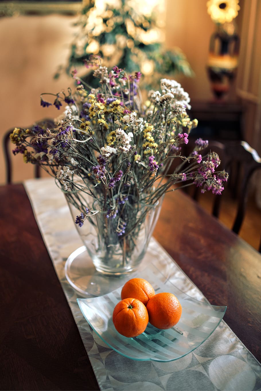 Table decor: flowers & oranges, cup, drink, flora, food, fruit HD wallpaper