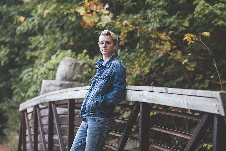 man leaning on the bridge, human, person, people, denim, pants HD wallpaper