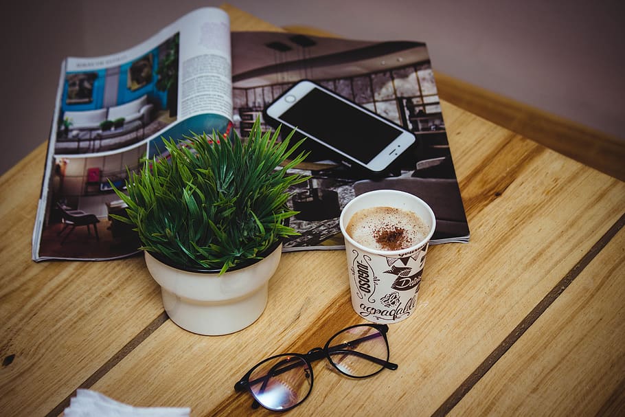 eyeglasses beside cup of latte and iPhone 6, coffee cup, mobile phone