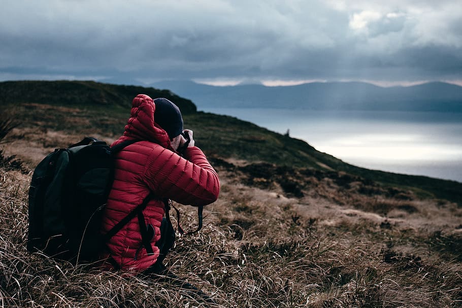 Person in Red Hoodie Taking a Photo of Wilderness, adult, adventure HD wallpaper