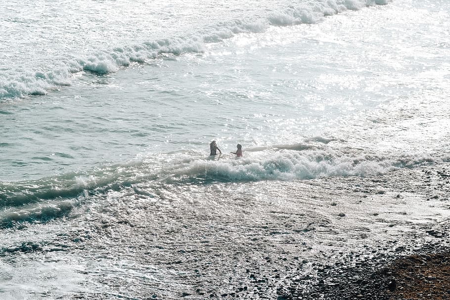ocean, water, waves, beach, play, sea, motion, sport, people HD wallpaper