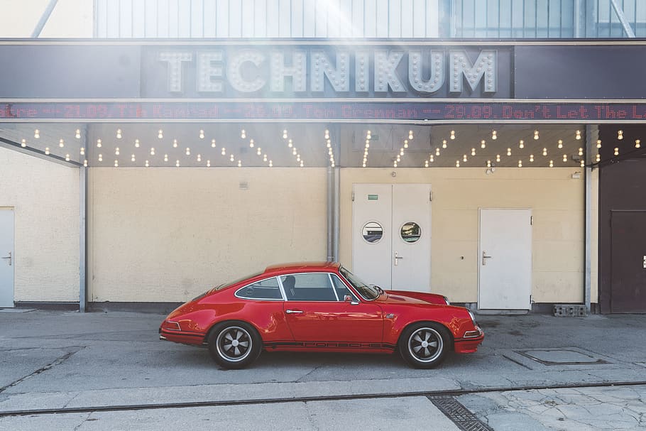 red coupe outside Technikum establishment, car, vehicle, automobile HD wallpaper