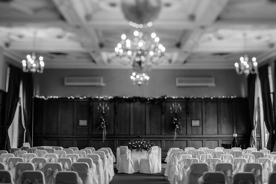 wedding ceremony setup in grayscale photo, seat, indoors, chair
