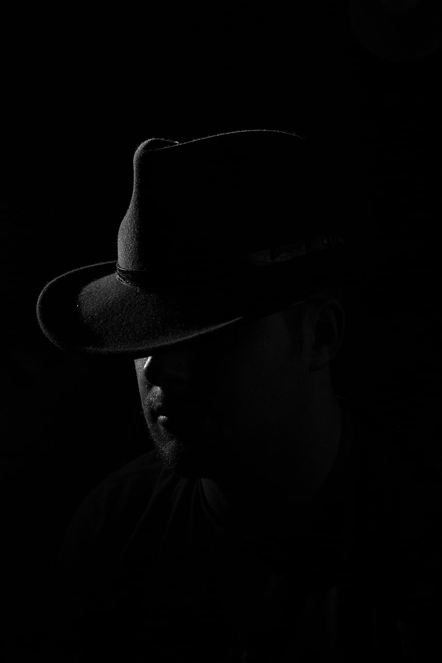man wearing black hat, apparel, clothing, person, human, sun hat
