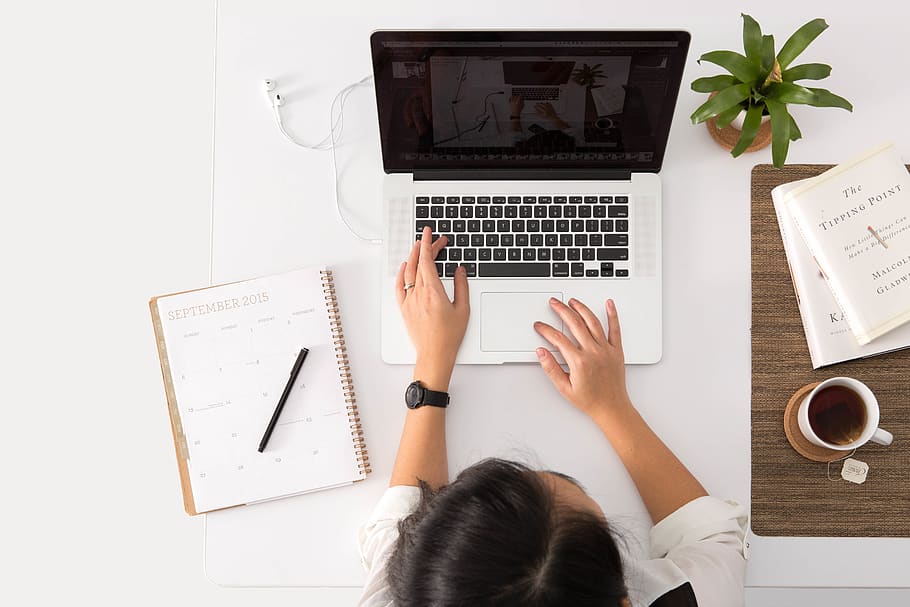 person using MacBook Pro, computer, laptop, wireless technology HD wallpaper
