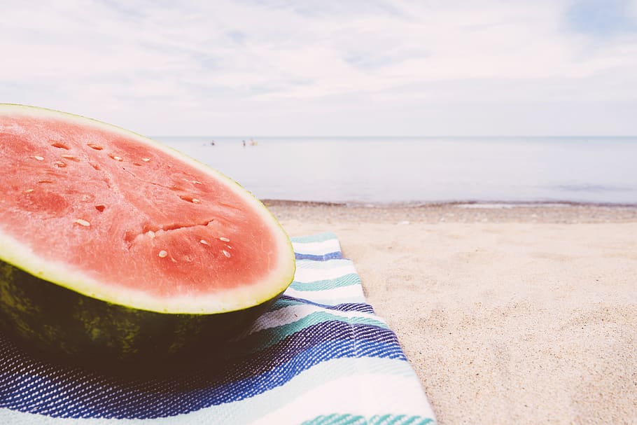 Sliced Water Melon on Textile Near Seashore, beach, beachlife, HD wallpaper