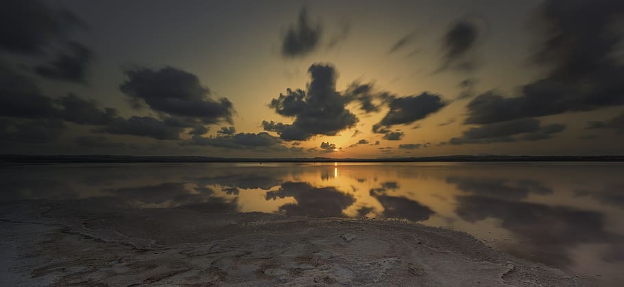 body of water under white sky at golden hour, sunset, reflection HD wallpaper