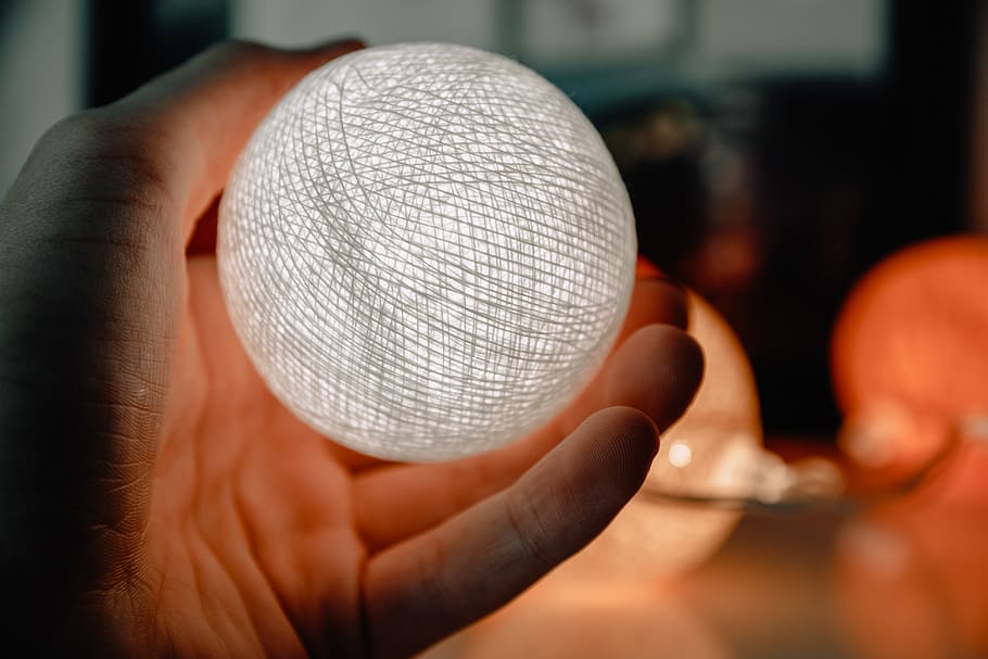 Person Holding White Ball, bright, hand, illuminated, lantern HD wallpaper