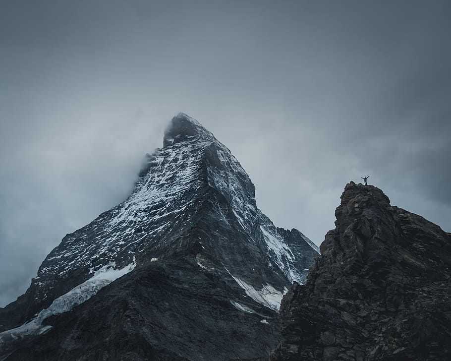 snowcap mountain, cloud, person, rock, mountain climbing, adventure HD wallpaper
