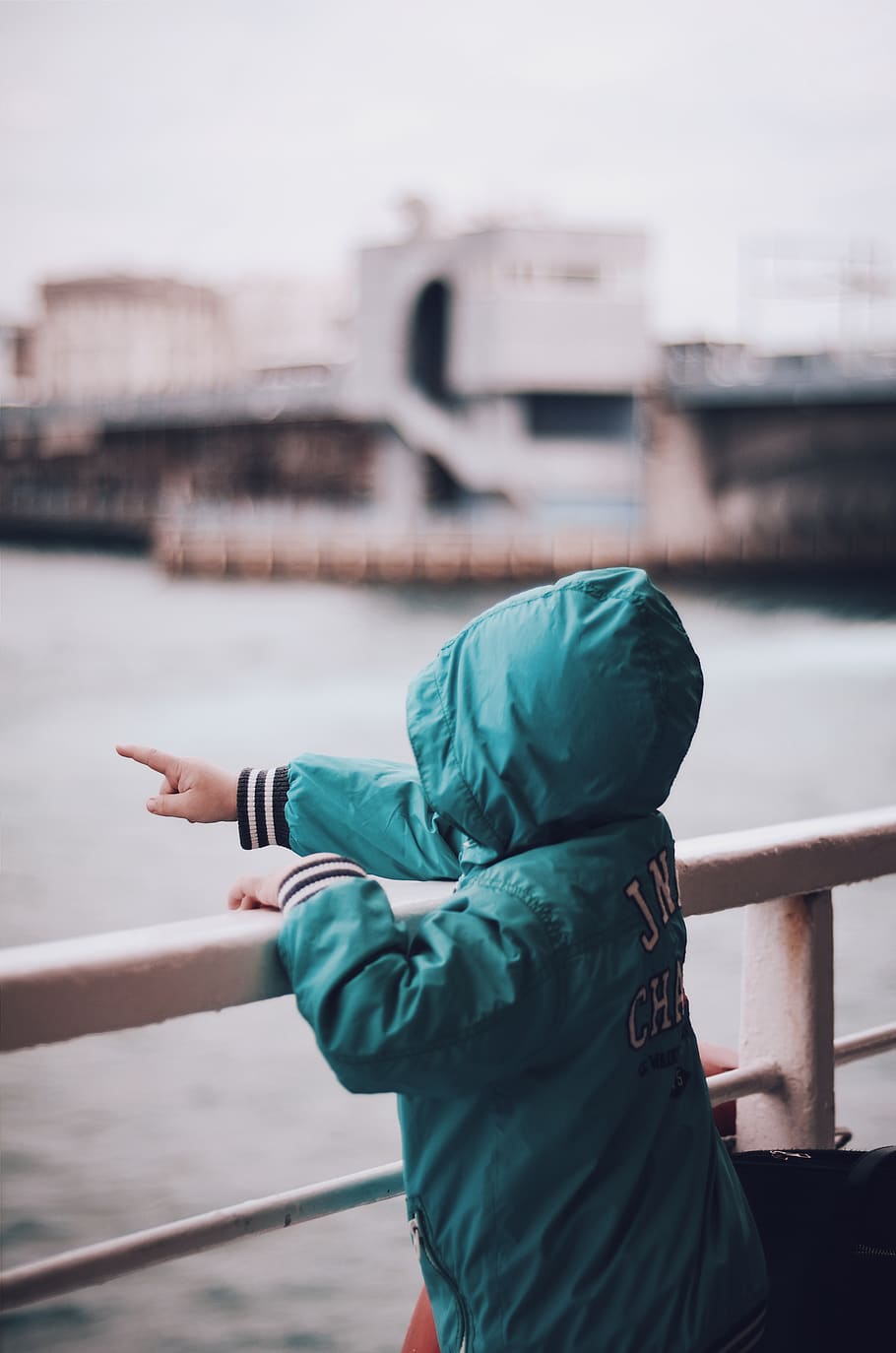 Toddler Wearing Green Hooded Jacket Pointing Right Index Finger, HD wallpaper