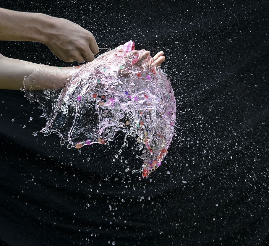 Person Playing With Water, balloon, hand, long-exposure, splash HD wallpaper