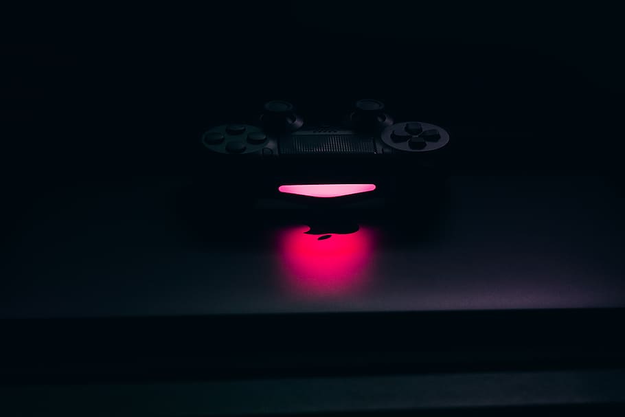 black multimedia device, indoors, illuminated, no people, red HD wallpaper