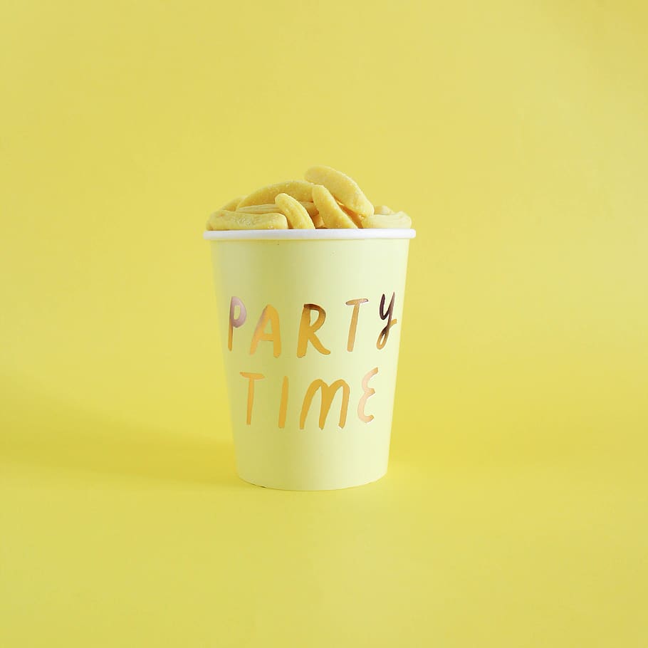 Party Time cup on yellow surface, food and drink, colored background HD wallpaper