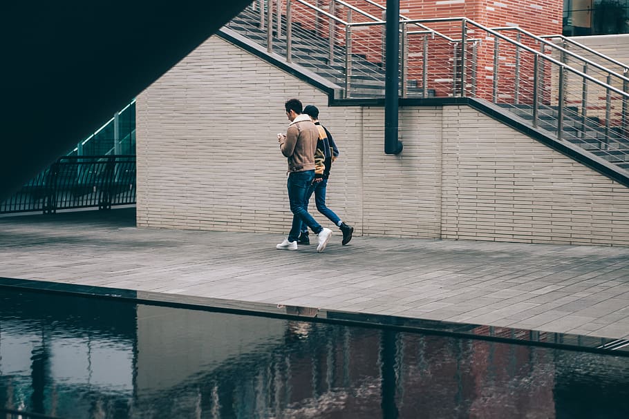 Two Men Walking Beside Staircase, bricks, cityscape, downtown HD wallpaper