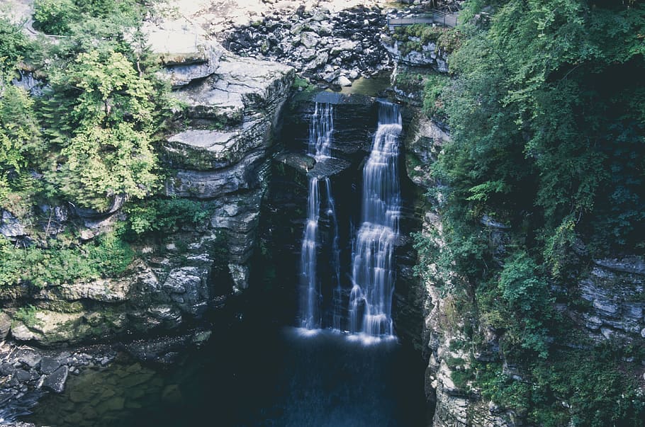 waterfalls between cliff during daytime, river, nature, outdoors HD wallpaper