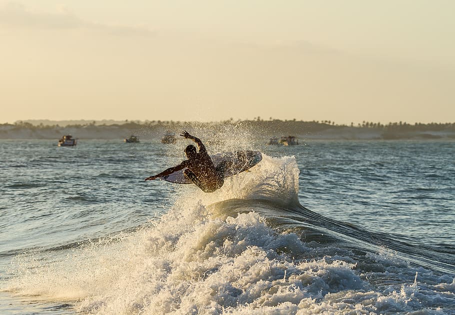 Person Surfboarding, action, beach, daylight, fun, landscape HD wallpaper