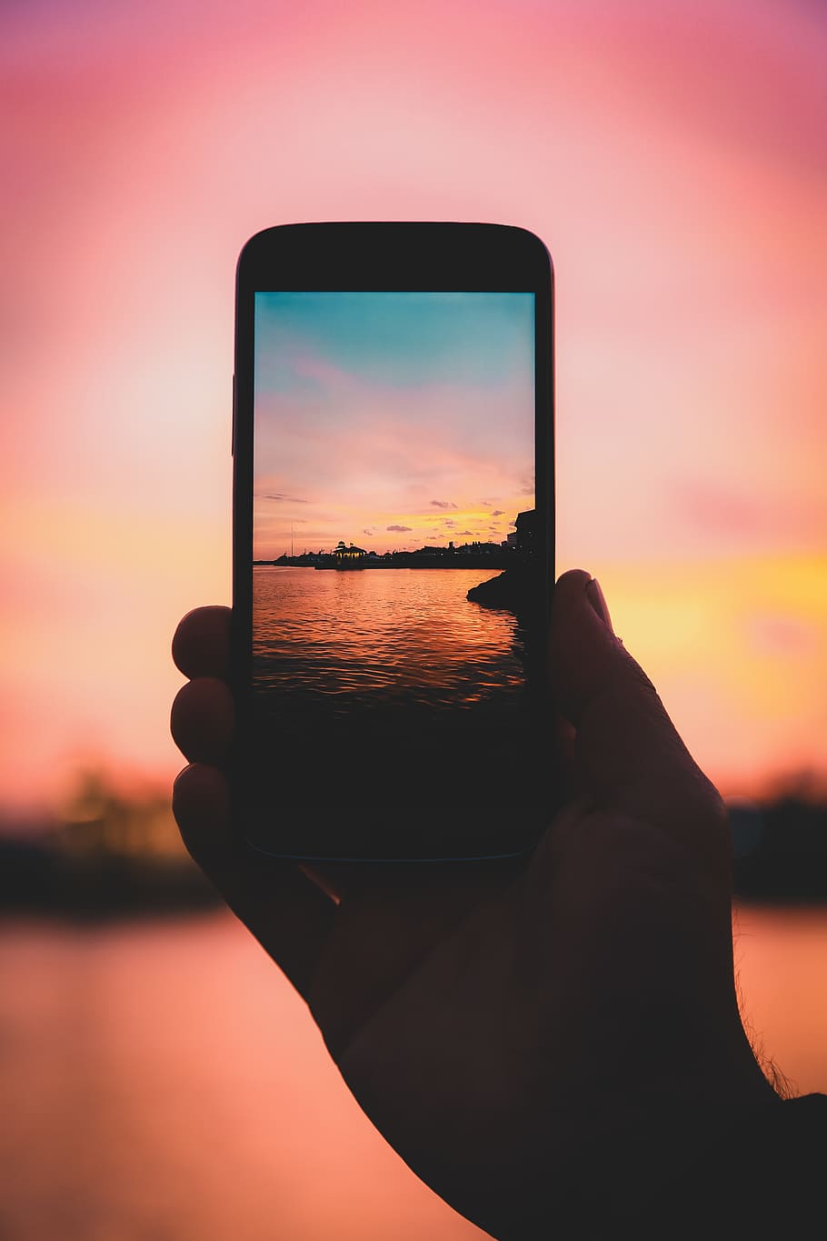 Person Holding Smartphone, backlit, beach, camera, close-up, clouds HD wallpaper