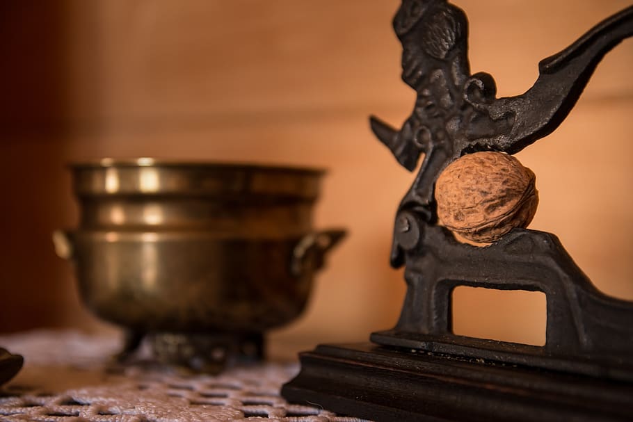 Brown Nut on Black Surface, food, nutcracker, walnut, indoors HD wallpaper