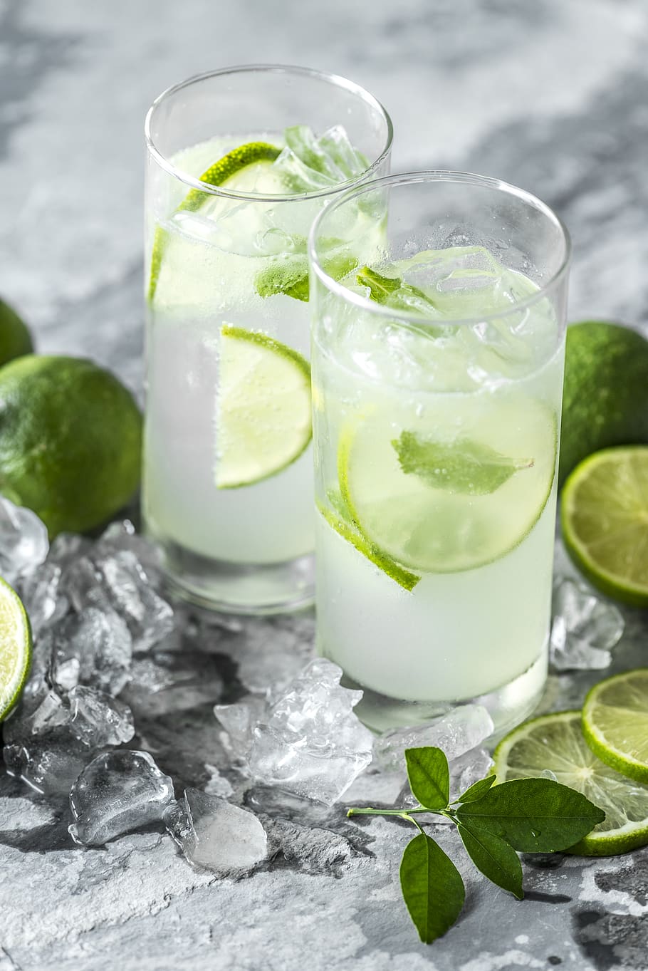 Two Clear Drinking Glasses , beverages, citrus, cold, fruit, juice HD wallpaper