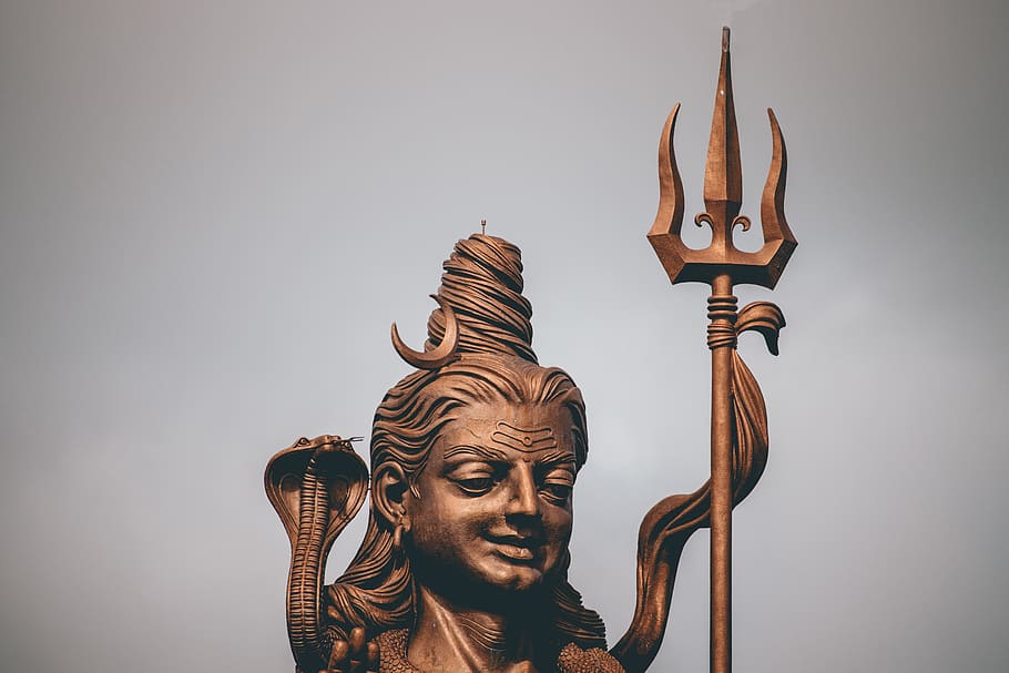 photo of Lord Shiva statue, person, people, human, emblem, spear