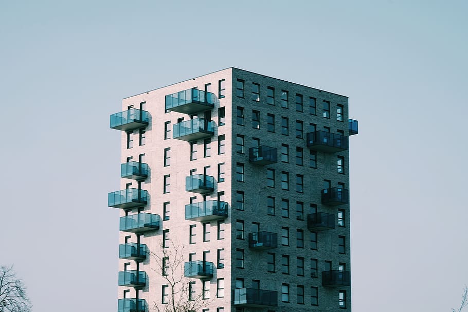 brown concrete building, city, town, high rise, urban, housing HD wallpaper