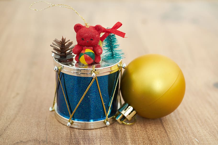 Blue Drum and Yellow Ornaments Placed on Wood, ball, bear, celebration HD wallpaper