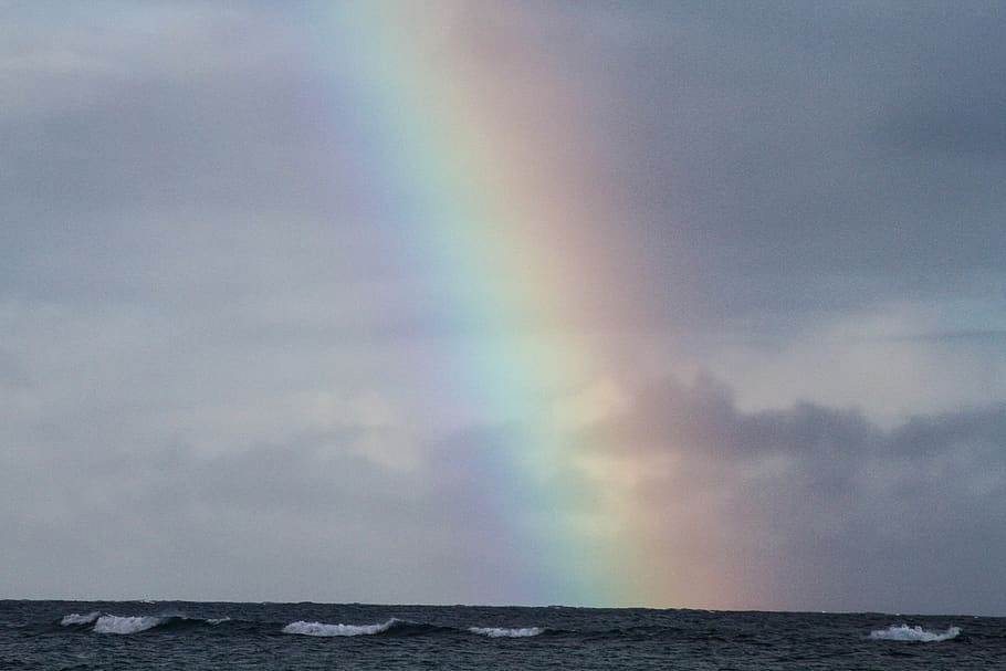 A rainbow shining through a cloudy sky., united states, haleiwa HD wallpaper